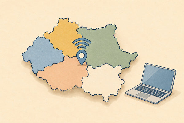 A paper map of West Yorkshire's five districts with a wifi pin and a laptop