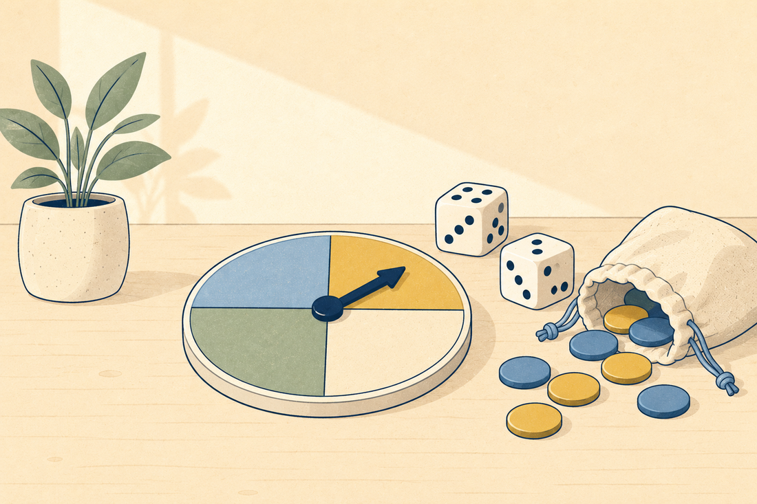 A spinner split into four, two dice and a cloth bag with counters spilling out
